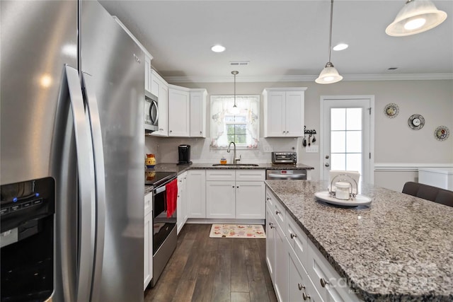 3015 Great Falls Highway, Chester, SC 29014 - kitchen featuring a sink, dark wood-style flooring, ornamental molding, and stainless steel appliances