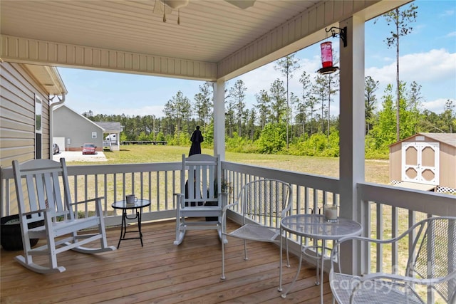 3015 Great Falls Highway, Chester, SC 29014 - deck with a yard, ceiling fan, an outbuilding, and a storage unit