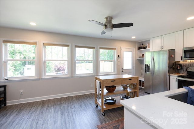 kitchen with ceiling fan, tasteful backsplash, open shelves, stainless steel appliances, and white cabinetry