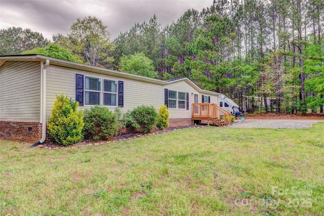 101 J M Ln, Lawndale, NC 28090 - view of side of home featuring a lawn and crawl space