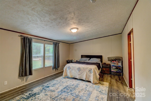 101 J M Ln, Lawndale, NC 28090 - bedroom featuring a textured ceiling, ornamental molding, and wood finished floors