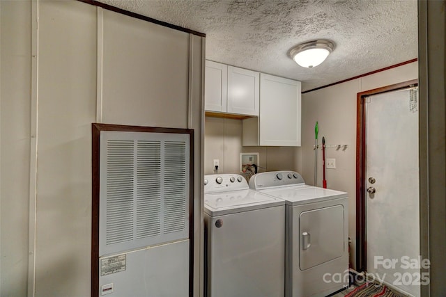 101 J M Ln, Lawndale, NC 28090 - clothes washing area with a textured ceiling, washer and clothes dryer, cabinet space, and a heating unit