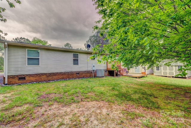 101 J M Ln, Lawndale, NC 28090 - back of house with a deck, a shed, crawl space, a lawn, and an outdoor structure