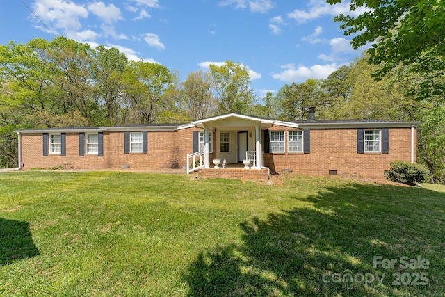 5013 Friendship Circle Rd, East Bend, NC 27018 - single story home with crawl space, a porch, brick siding, and a front lawn