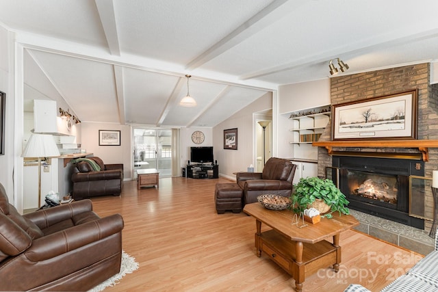 5013 Friendship Circle Rd, East Bend, NC 27018 - living room with a brick fireplace and light wood-style floors
