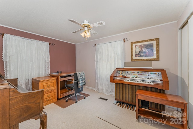 5013 Friendship Circle Rd, East Bend, NC 27018 - home office with ceiling fan, carpet, and ornamental molding
