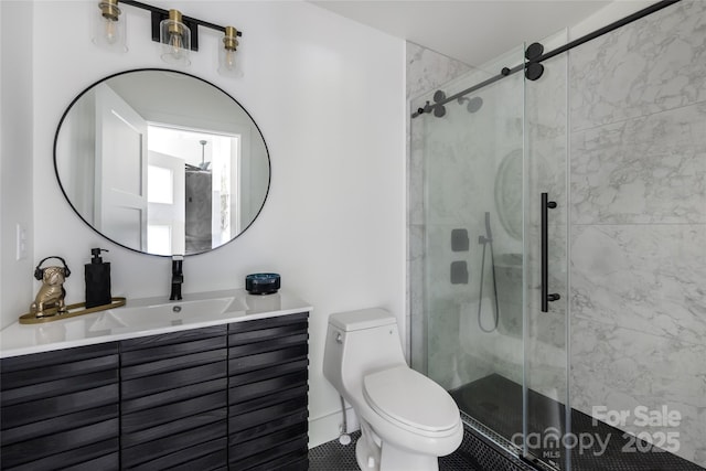 full bath featuring vanity, tile patterned flooring, a shower stall, and toilet