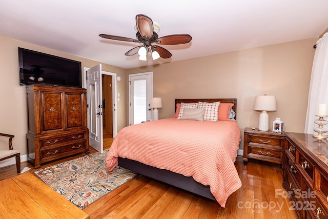 bedroom featuring ceiling fan and wood finished floors