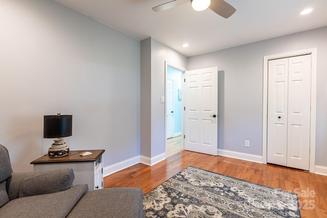 entrance foyer with baseboards, a ceiling fan, light wood finished floors, and recessed lighting