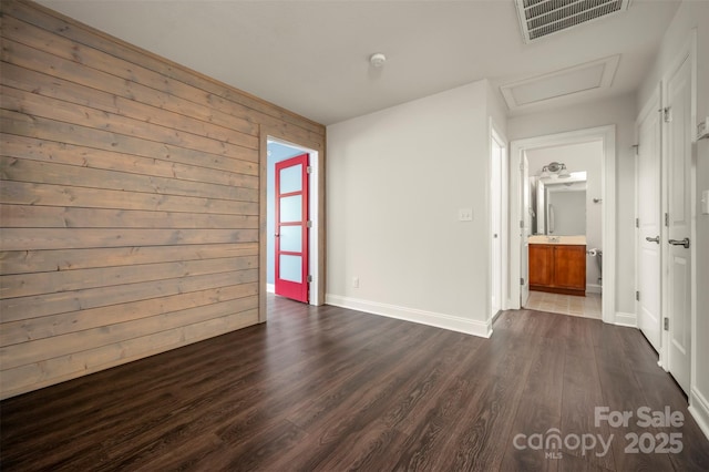 20 Foxden Dr Unit 301, Fletcher, NC 28732 - empty room with baseboards, visible vents, attic access, and dark wood-type flooring