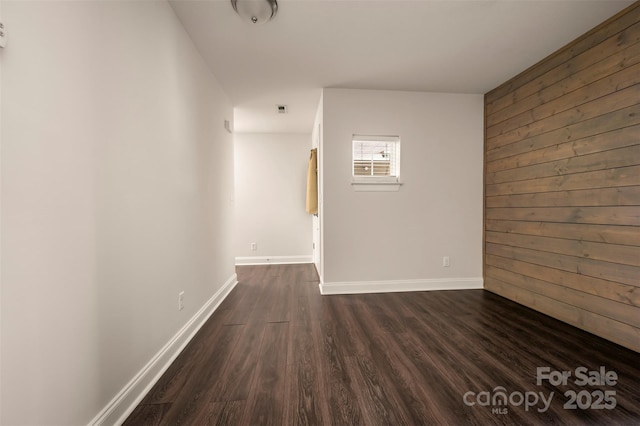 20 Foxden Dr Unit 301, Fletcher, NC 28732 - interior space featuring wooden walls, baseboards, and dark wood finished floors
