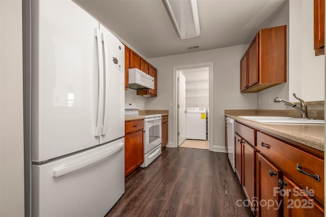 20 Foxden Dr Unit 301, Fletcher, NC 28732 - kitchen with visible vents, washer / dryer, white appliances, light countertops, and a sink