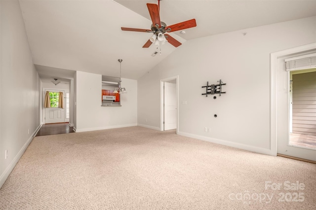 20 Foxden Dr Unit 301, Fletcher, NC 28732 - unfurnished living room featuring carpet floors, ceiling fan, baseboards, and lofted ceiling