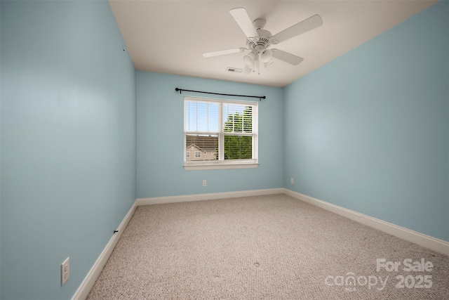 20 Foxden Dr Unit 301, Fletcher, NC 28732 - unfurnished room featuring baseboards, a ceiling fan, carpet floors, and visible vents