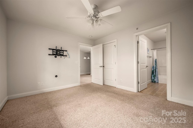 20 Foxden Dr Unit 301, Fletcher, NC 28732 - unfurnished bedroom featuring carpet flooring, baseboards, ensuite bathroom, and a closet