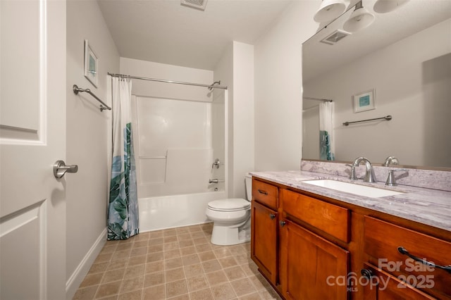 20 Foxden Dr Unit 301, Fletcher, NC 28732 - bathroom featuring visible vents, shower / bath combo with shower curtain, toilet, and vanity