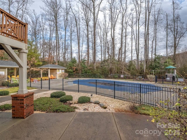 20 Foxden Dr Unit 301, Fletcher, NC 28732 - pool featuring a patio, a playground, and fence