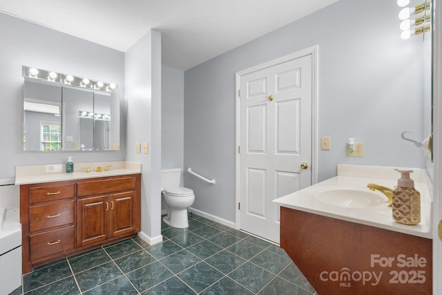 full bathroom featuring tile patterned flooring, a sink, two vanities, and toilet