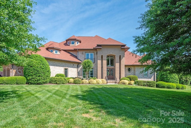 8904 Woodhall Lake Dr, Waxhaw, NC 28173 - view of front of property with brick siding and a front lawn