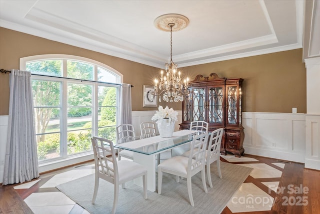 8904 Woodhall Lake Dr, Waxhaw, NC 28173 - dining room with an inviting chandelier, plenty of natural light, and a tray ceiling