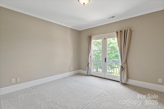 8904 Woodhall Lake Dr, Waxhaw, NC 28173 - unfurnished room with visible vents, ornamental molding, baseboards, french doors, and carpet