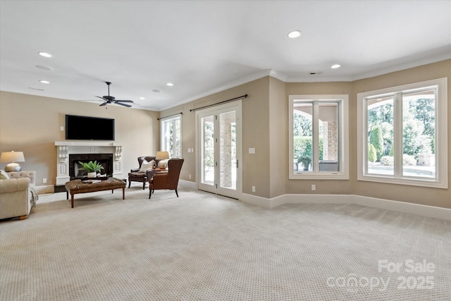 8904 Woodhall Lake Dr, Waxhaw, NC 28173 - living area with light colored carpet, ornamental molding, and a healthy amount of sunlight