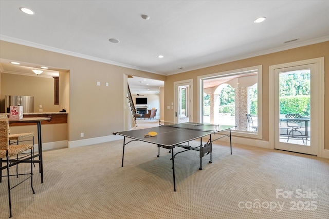 8904 Woodhall Lake Dr, Waxhaw, NC 28173 - game room featuring crown molding, recessed lighting, baseboards, and light carpet