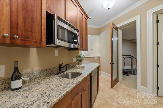 8904 Woodhall Lake Dr, Waxhaw, NC 28173 - kitchen featuring french doors, a sink, light stone counters, ornamental molding, and stainless steel appliances