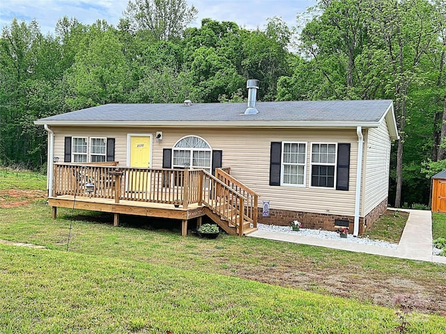view of front of house featuring roof with shingles, a wooden deck, a front lawn, and crawl space