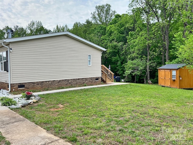 view of property exterior featuring a storage shed, crawl space, a yard, and an outbuilding