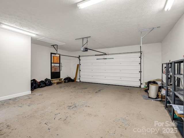 209 Daniel Dr, Hendersonville, NC 28739 - garage featuring a garage door opener