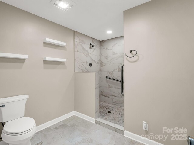 209 Daniel Dr, Hendersonville, NC 28739 - full bath featuring marble look tiles, baseboards, a marble finish shower, toilet, and recessed lighting