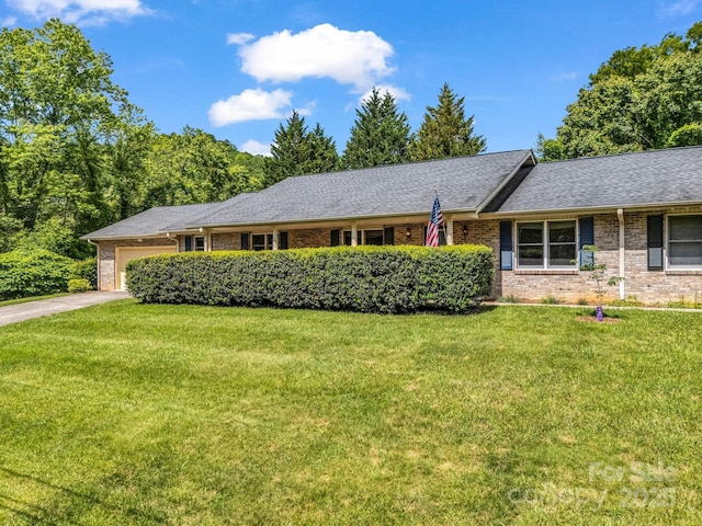 209 Daniel Dr, Hendersonville, NC 28739 - single story home with a garage, a front yard, brick siding, and driveway