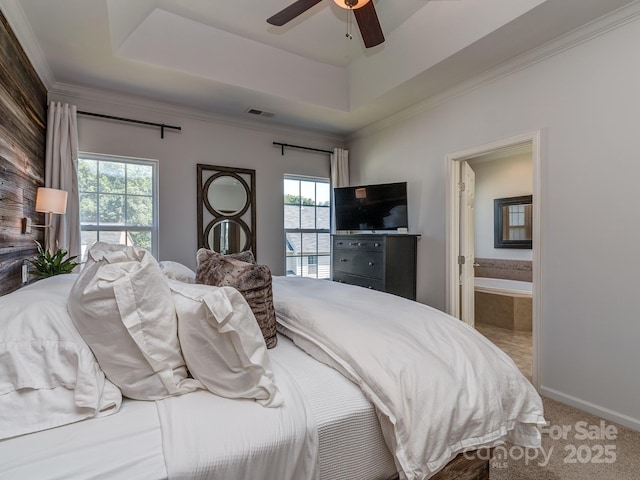 2125 Belle Vernon Ave, Charlotte, NC 28210 - bedroom with a raised ceiling, carpet floors, connected bathroom, ornamental molding, and ceiling fan