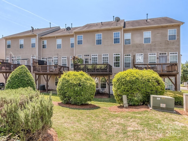 2125 Belle Vernon Ave, Charlotte, NC 28210 - back of house with central AC unit, a yard, and a deck