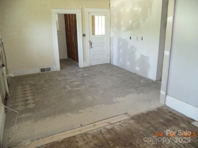 empty room featuring visible vents
