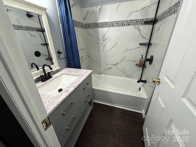 full bath featuring shower / bath combination with curtain, wood finished floors, and vanity