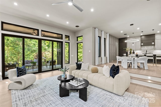 624 Heather Ln, Charlotte, NC 28209 - living area with a ceiling fan, healthy amount of natural light, light wood-style floors, and recessed lighting