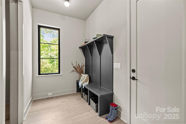 624 Heather Ln, Charlotte, NC 28209 - mudroom featuring light wood finished floors and baseboards