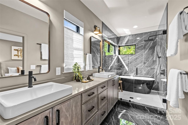 624 Heather Ln, Charlotte, NC 28209 - bathroom with marble look tiles, a soaking tub, double vanity, walk in shower, and recessed lighting