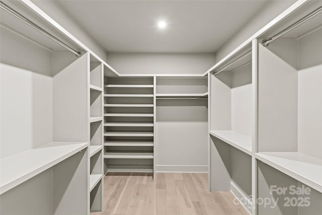 624 Heather Ln, Charlotte, NC 28209 - spacious closet with light wood-style flooring