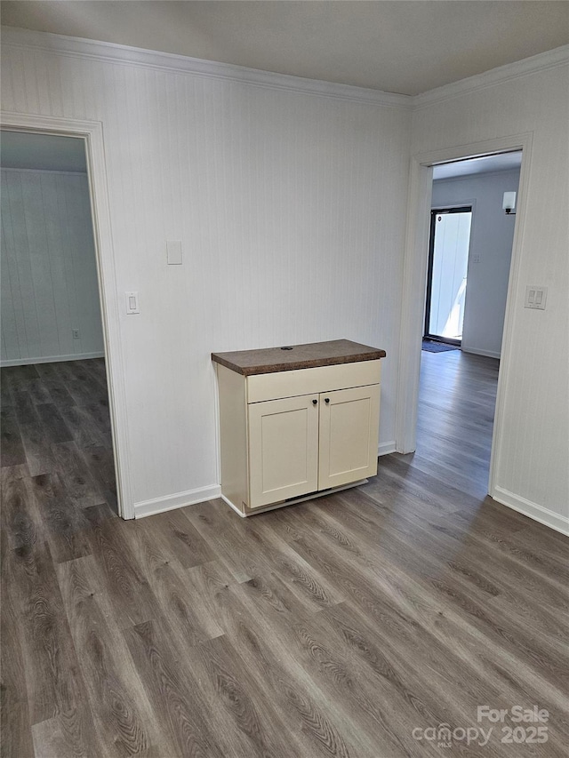1109 Reid Harkey Rd, Matthews, NC 28105 - unfurnished room with ornamental molding, dark wood-style flooring, and baseboards