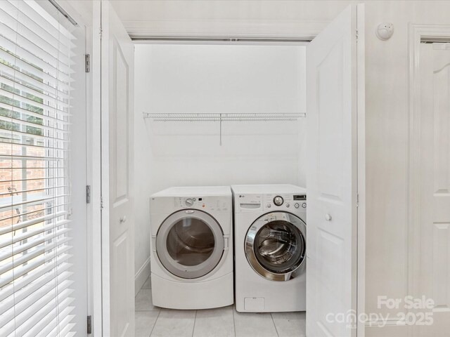 140 Villa Lake Dr, Fort Mill, SC 29708 - laundry room featuring light tile patterned floors and independent washer and dryer