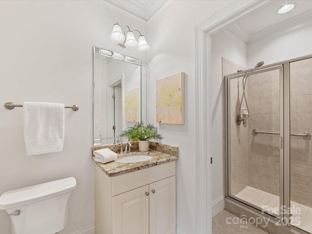 140 Villa Lake Dr, Fort Mill, SC 29708 - full bathroom with crown molding, a stall shower, toilet, vanity, and baseboards