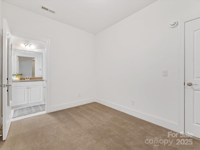 140 Villa Lake Dr, Fort Mill, SC 29708 - unfurnished bedroom with carpet floors, baseboards, connected bathroom, and a sink