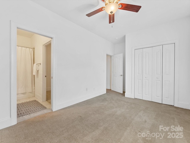 140 Villa Lake Dr, Fort Mill, SC 29708 - unfurnished bedroom featuring carpet flooring, a closet, connected bathroom, a ceiling fan, and baseboards