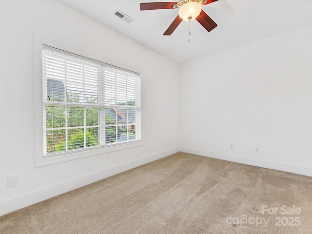 140 Villa Lake Dr, Fort Mill, SC 29708 - spare room featuring light colored carpet, baseboards, and ceiling fan
