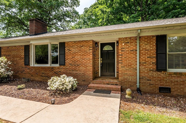 13030 Mayes Rd, Huntersville, NC 28078 - doorway to property with a chimney, brick siding, and crawl space