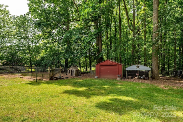 13030 Mayes Rd, Huntersville, NC 28078 - view of yard with a storage shed, an outbuilding, fence, and a garage