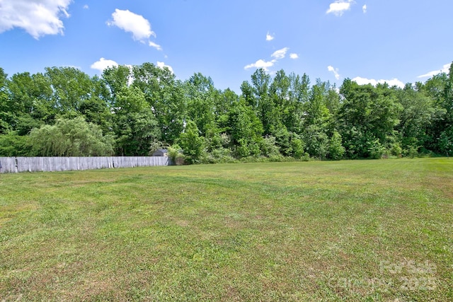 view of yard featuring fence